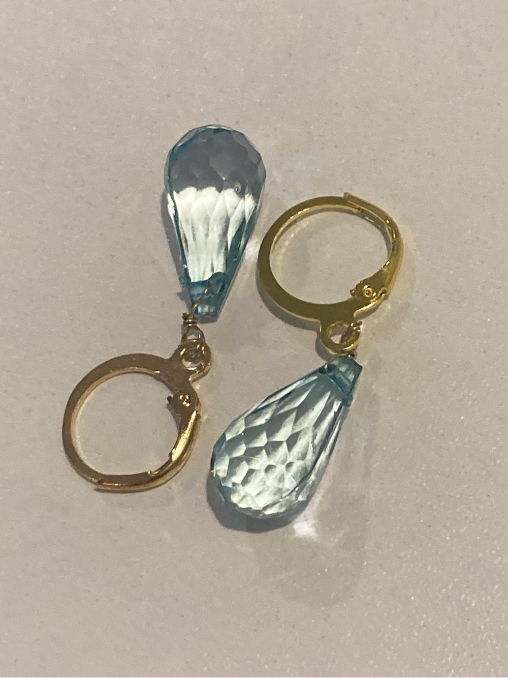 Gold Hoop Earrings with Light Blue Faceted Teardrop Drops
